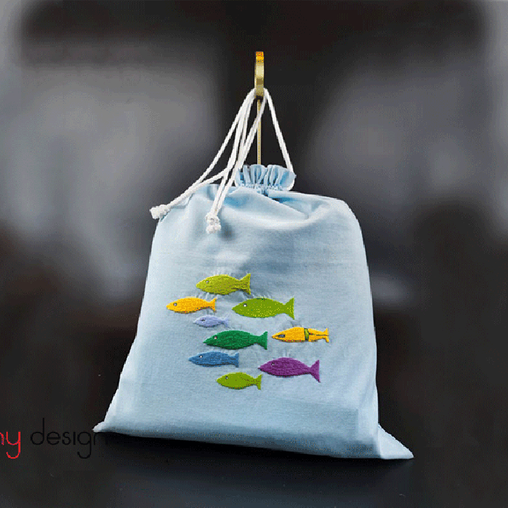 Laundry bag with fish embroidery